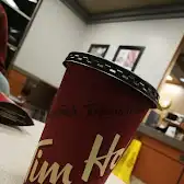 Tim Hortons storefront and interior at 1325 Front St, Hearst, ON