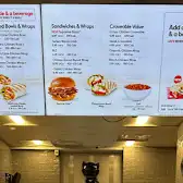 Tim Hortons storefront and interior at 1986 Highway 15 Codes Corner, Kingston, ON