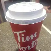 Tim Hortons storefront and interior at 1061 Wonderland Rd South, London, ON