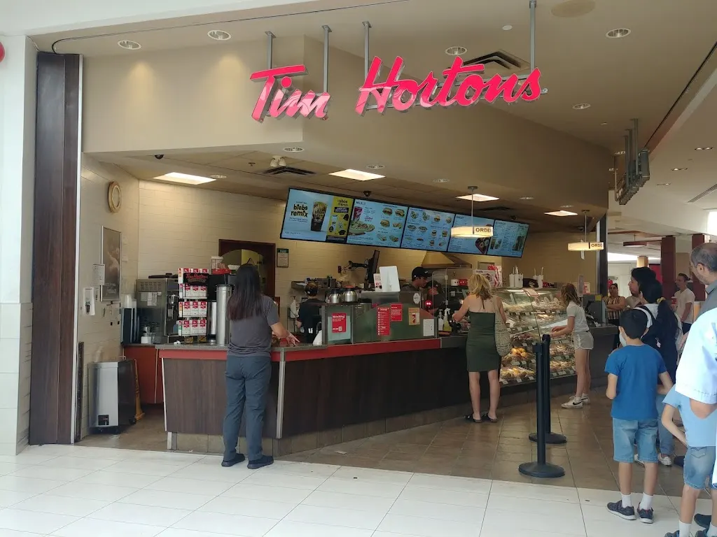 Tim Hortons storefront and interior at 1105 Wellington Rd, London, ON