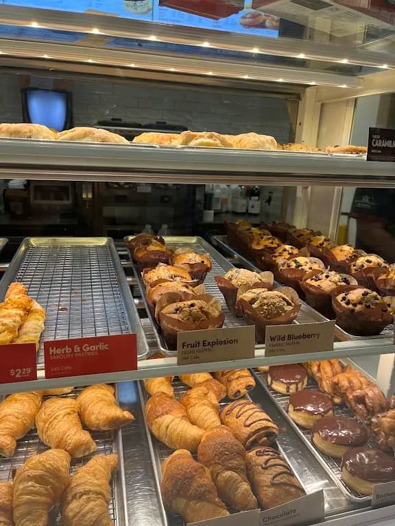 Tim Hortons storefront and interior at Vaughan Cortellucci Hospital Food Court, Maple, ON