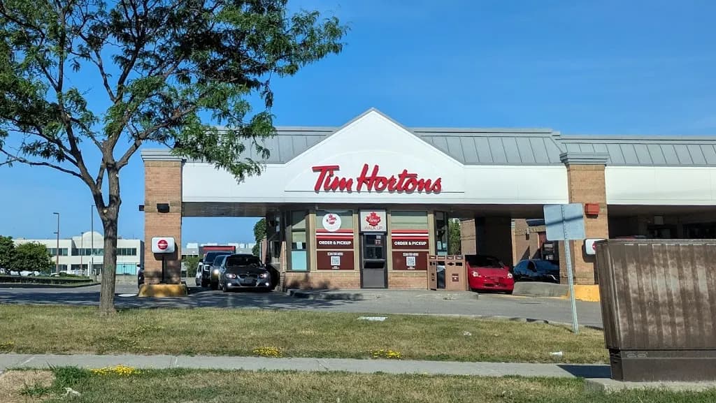 Tim Hortons storefront and interior at 7690 Woodbine Ave, Markham, ON