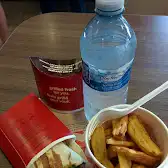 Tim Hortons storefront and interior at 8801 Woodbine Ave, Markham, ON
