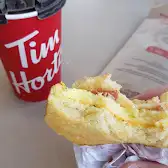Tim Hortons storefront and interior at 3060 Artesian Dr, Mississauga, ON
