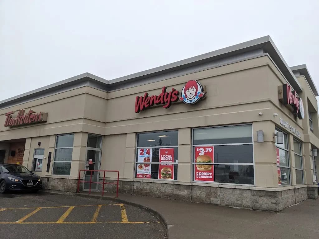 Tim Hortons storefront and interior at 6966 Financial Dr, Mississauga, ON