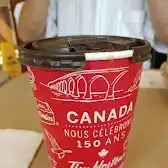 Tim Hortons storefront and interior at 7480 Airport Rd, Mississauga, ON