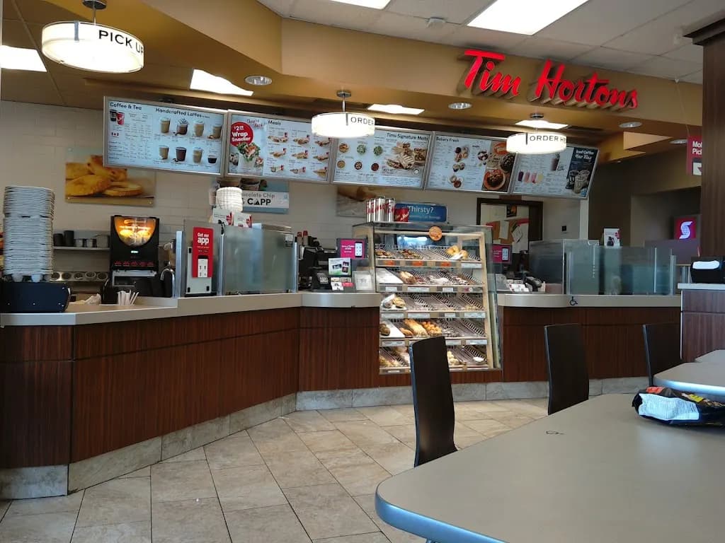 Tim Hortons storefront and interior at 1 Rideaucrest Dr, Nepean, ON