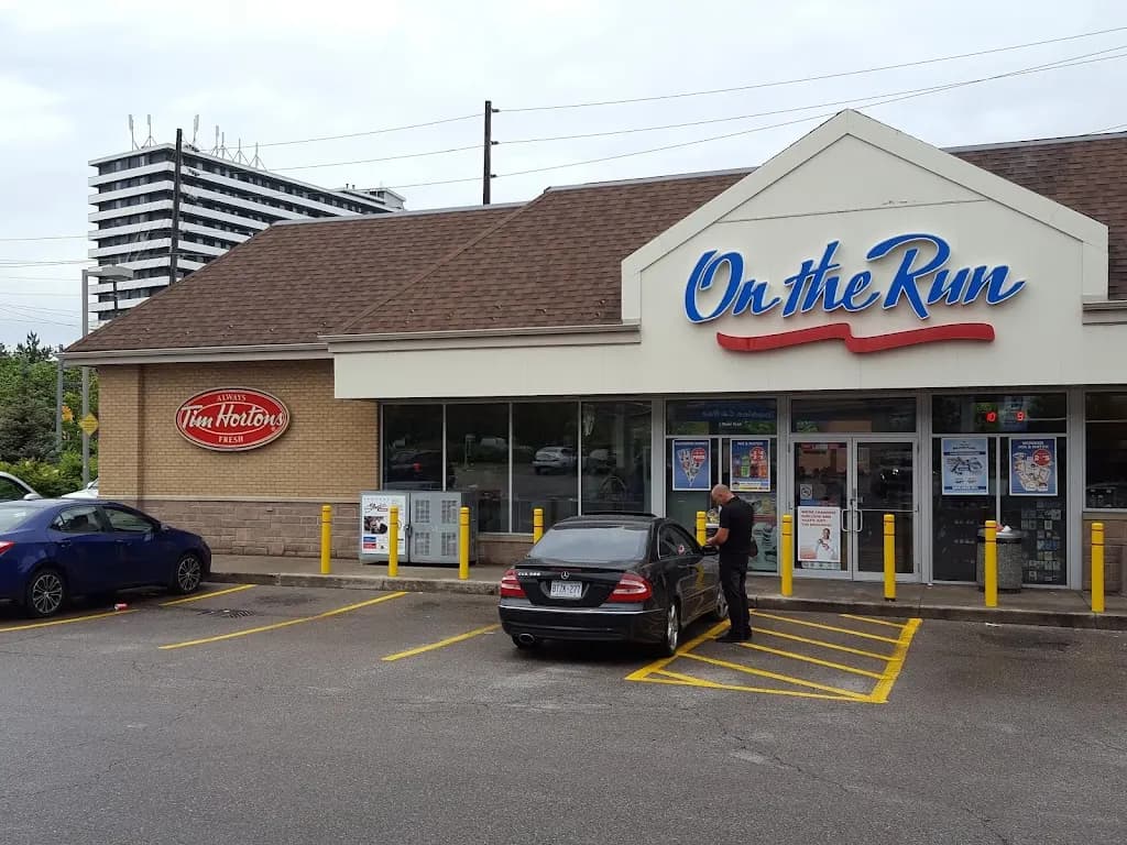 Tim Hortons storefront and interior at 515 Drewry Ave, North York, ON
