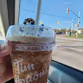 Tim Hortons storefront and interior at 2020 Trim Rd, Orleans, ON