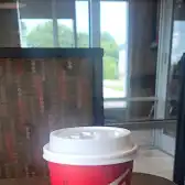 Tim Hortons storefront and interior at 251 Ritson Rd N, Oshawa, ON