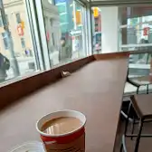 Tim Hortons storefront and interior at 187 Bank St, Ottawa, ON