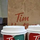 Tim Hortons storefront and interior at 200 Sparks St, Ottawa, ON
