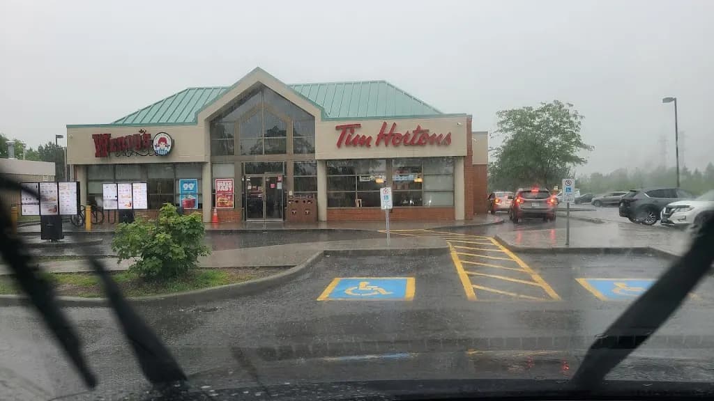 Tim Hortons storefront and interior at 1950 Walkley Rd, Ottawa, ON