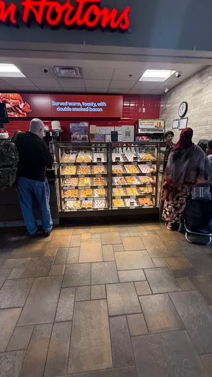 Tim Hortons storefront and interior at 2277 Riverside Dr, Ottawa, ON