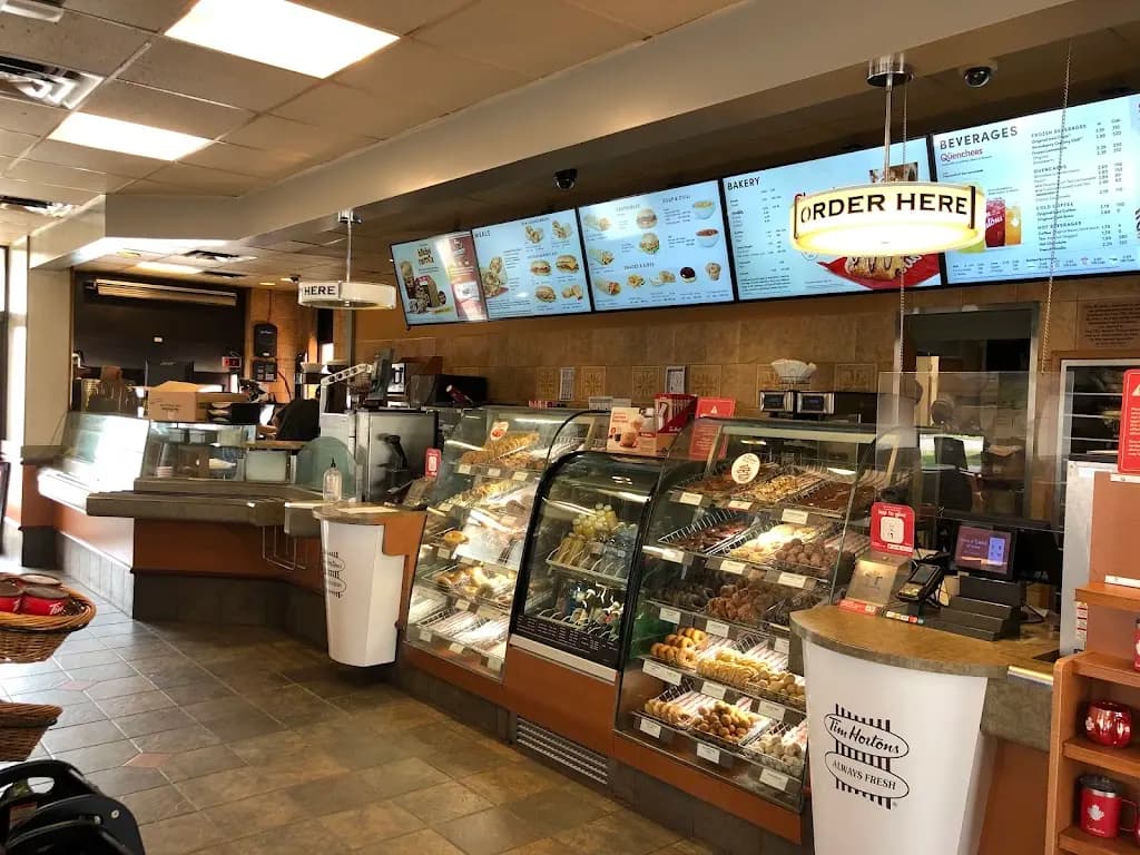 Tim Hortons storefront and interior at 151 Dundas St E, Paris, ON
