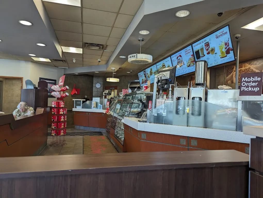 Tim Hortons storefront and interior at 136 Gore St East, Perth, ON