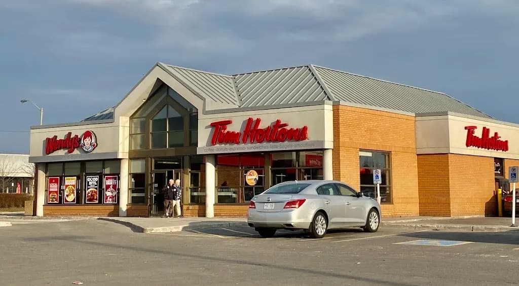 Tim Hortons storefront and interior at 4 Lebovic Ave, Scarborough, ON