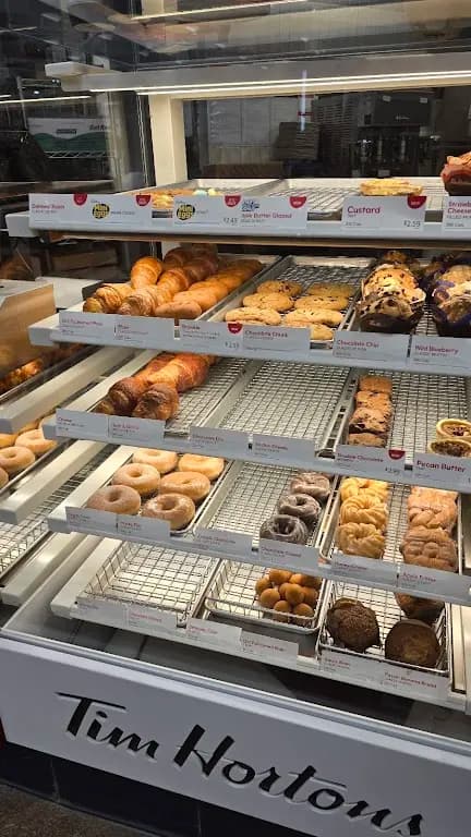 Tim Hortons storefront and interior at 4000 Finch Ave East, Scarborough, ON