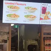 Tim Hortons storefront and interior at 8129 Sheppard Ave, Scarborough, ON