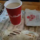 Tim Hortons storefront and interior at 145 Hartzel Rd, St Catharines, ON