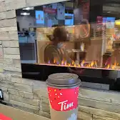 Tim Hortons storefront and interior at 82 Front St, Sturgeon Falls, ON