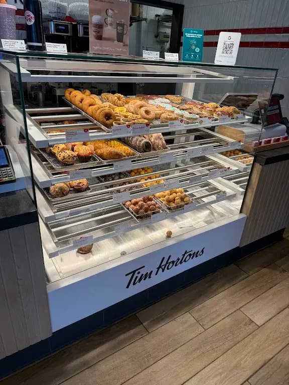 Tim Hortons storefront and interior at 121 East Ave, Thunder Bay, ON