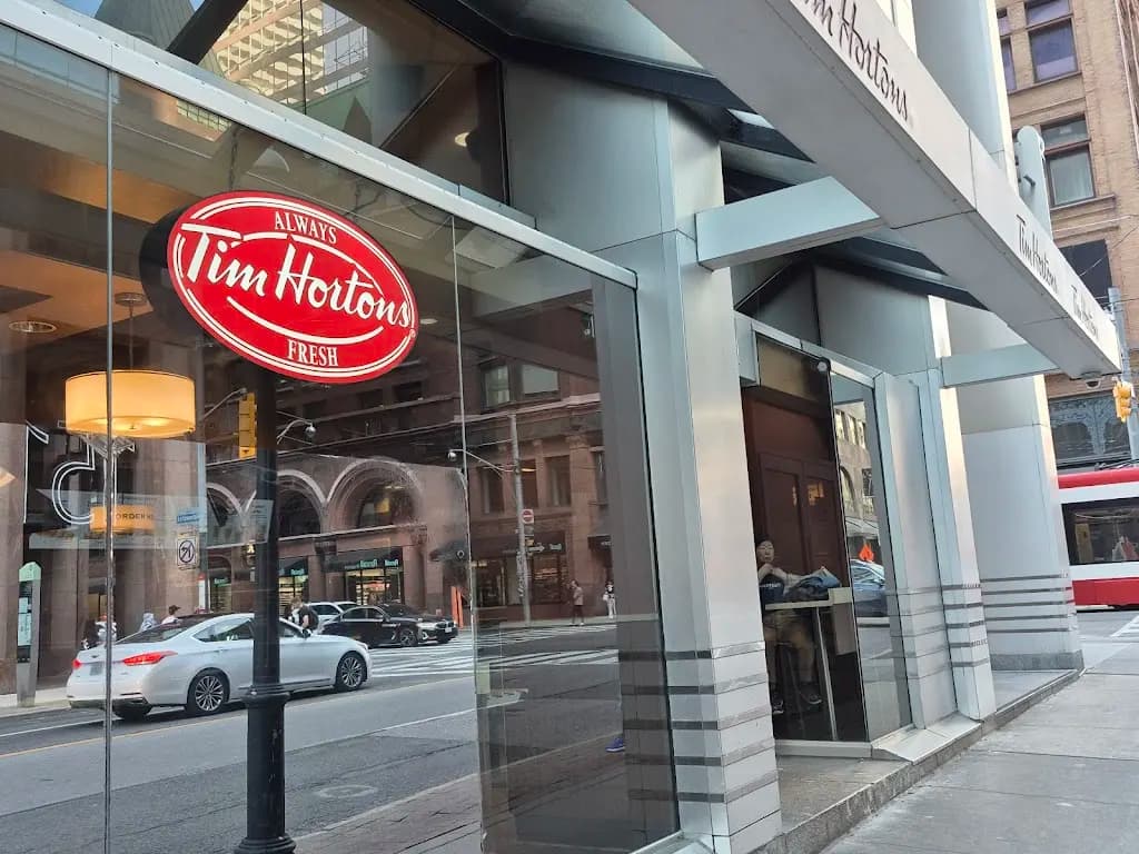 Tim Hortons storefront and interior at 1 Richmond St West, Toronto, ON