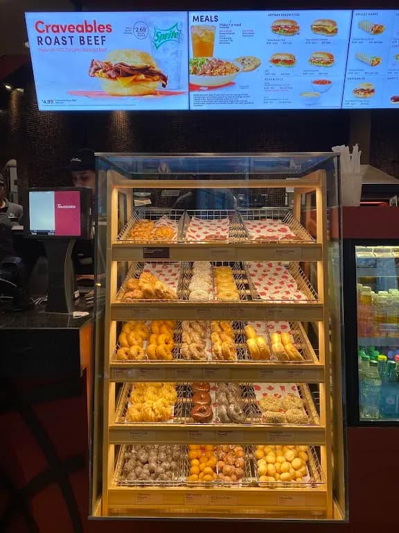 Tim Hortons storefront and interior at 18 King St East, Toronto, ON