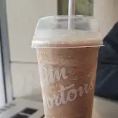 Tim Hortons storefront and interior at 18 King St East, Toronto, ON