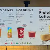 Tim Hortons storefront and interior at 18 Yorkville Avenue, Toronto, ON