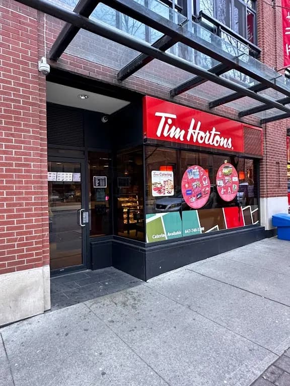 Tim Hortons storefront and interior at 55 Front St East, Toronto, ON