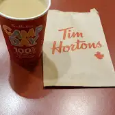 Tim Hortons storefront and interior at 55 Front St East, Toronto, ON