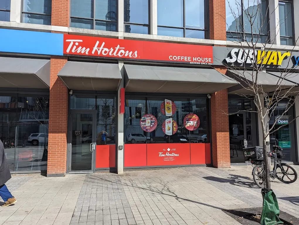Tim Hortons storefront and interior at 69 Regent Park Blvd, Toronto, ON