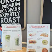 Tim Hortons storefront and interior at 82 Adelaide St E, Toronto, ON