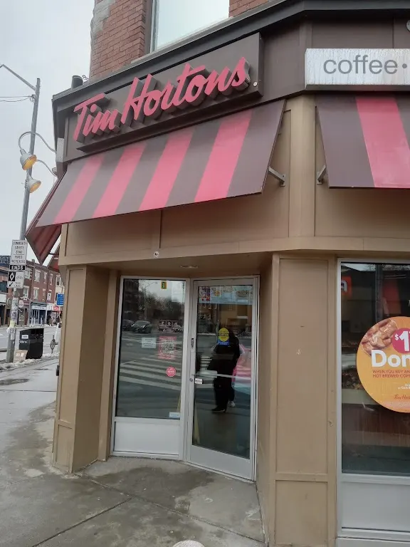Tim Hortons storefront and interior at 91 Danforth Ave, Toronto, ON