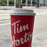Tim Hortons storefront and interior at 100 King St West, Toronto, ON