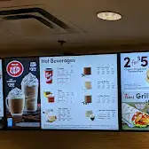 Tim Hortons storefront and interior at 148 Simcoe St, Toronto, ON