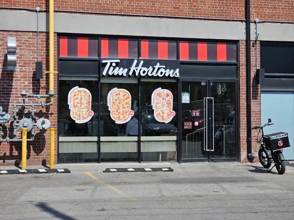 Tim Hortons storefront and interior at 171 East Liberty St, Toronto, ON