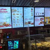 Tim Hortons storefront and interior at 181 Bay St, Toronto, ON