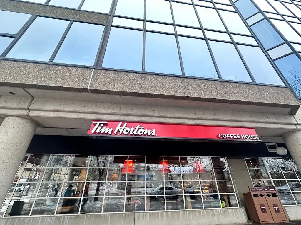Tim Hortons storefront and interior at 249 Queens Quay West, Toronto, ON