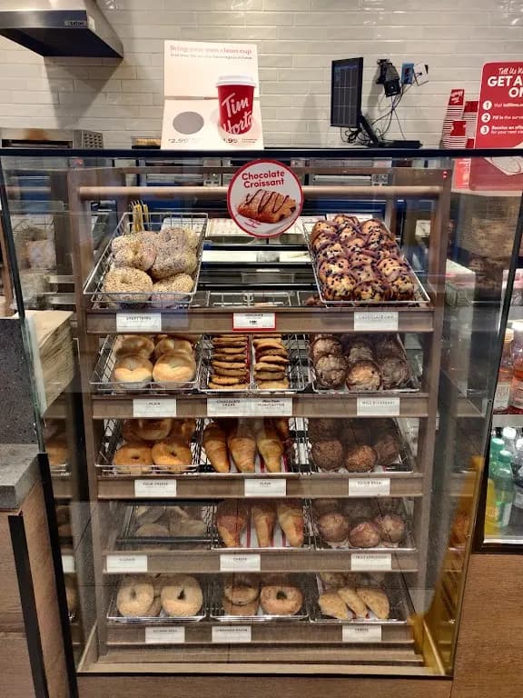 Tim Hortons storefront and interior at 250 Bloor St East., Toronto, ON