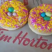 Tim Hortons storefront and interior at 323 Richmond Street East, Toronto, ON