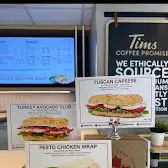 Tim Hortons storefront and interior at 426 Danforth Avenue, Toronto, ON