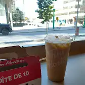 Tim Hortons storefront and interior at 438 University Ave, Toronto, ON