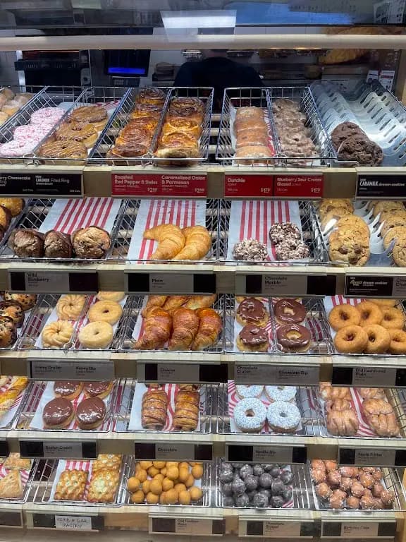 Tim Hortons storefront and interior at 477 Dundas St West, Toronto, ON