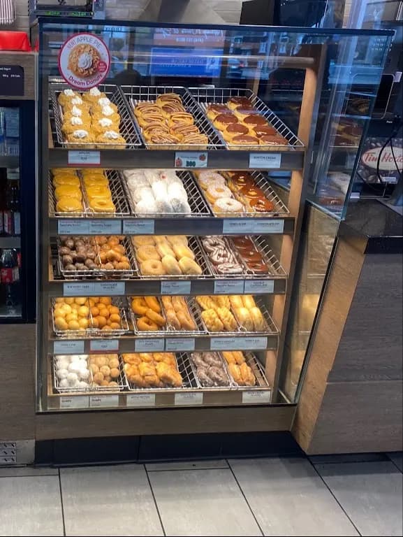 Tim Hortons storefront and interior at 550 St Clair Ave West, Toronto, ON