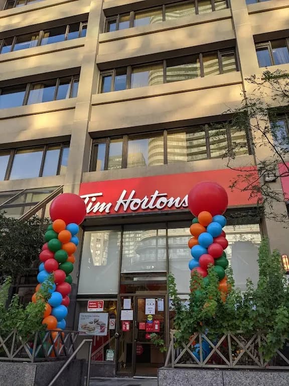Tim Hortons storefront and interior at 555 Yonge St, Toronto, ON