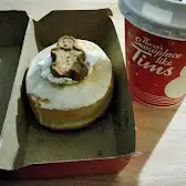Tim Hortons storefront and interior at 561 O' Connor Dr, Toronto, ON