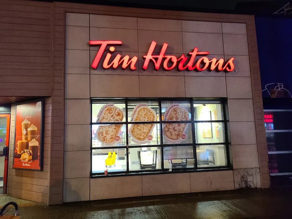 Tim Hortons storefront and interior at 659 Queen St W, Toronto, ON