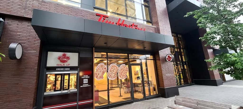 Tim Hortons storefront and interior at 686 Dundas St E, Toronto, ON